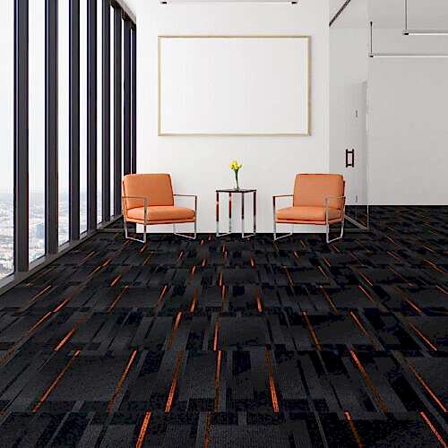 Antrasit desenli karo halı Pasteur 15 zemini olduğundan daha uzun gösterir.